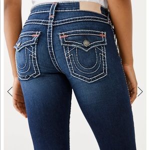 Dark true religion jeans with white stitching